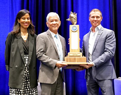 Kevin Hendrickson (second from left) receives the Caribbean Hotelier of the Year award from former winner Adam Stewart, Executive Chairman, Sandals Resorts International. At left is Nicola Madden-Greig, President,  Caribbean Hotel and Tourism Association