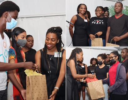 Winners of the St. Martin Caribbean Social Studies Competition 2022, receiving their prizes at the Main Book Launch and Closing Ceremony of the 20th annual St. Martin Book Fair. 