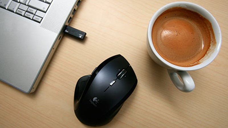 Laptop, mouse and a coffee 