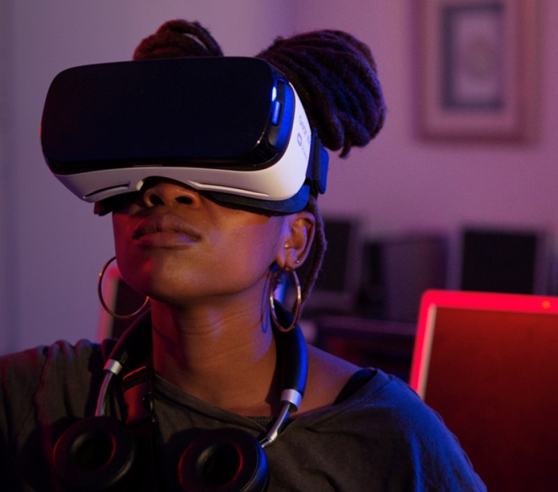 Girl wearing Virtual Reality headset 
