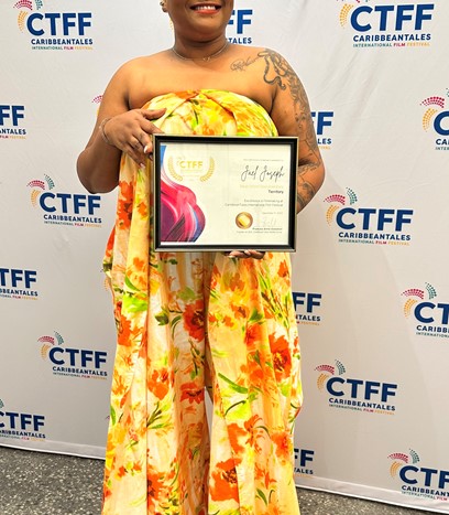 Territory” Director Jael Joseph poses with her award for “Best Short Documentary”