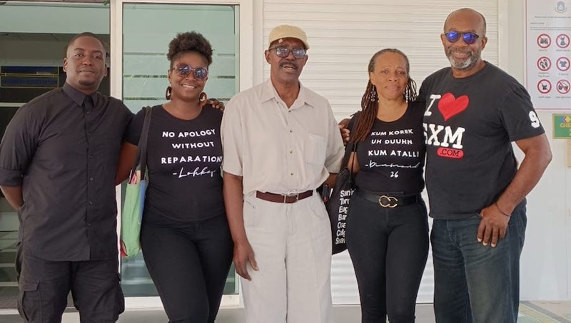 One SXM members and leading St. Martin activists at the Government Administration Building. 