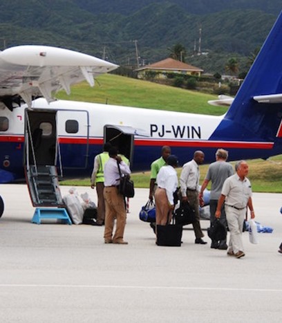 WinAir Twin Otter Aircraft letting off passengers