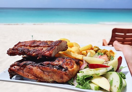 Food shown on a beach in Anguilla